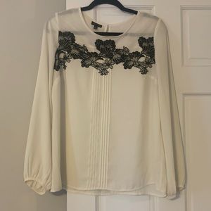 Women’s lace trimmed blouse